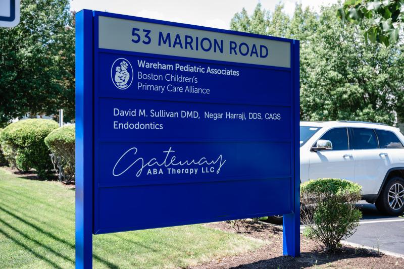 a road sign for wareham pediatrics